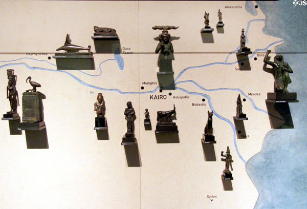 Figures of local gods (14th-1stC BCE) displayed on map of Nile around delta of Lower Egypt at Museum Ägyptischer Kunst. Munich, Germany.
