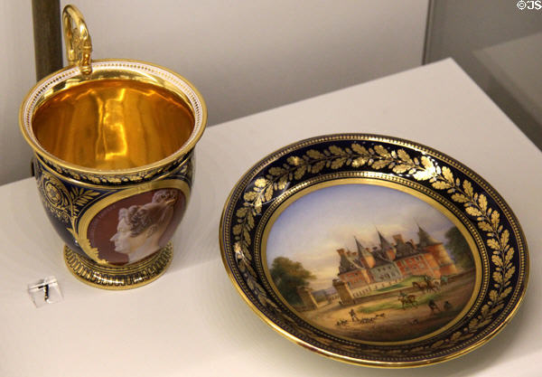 Porcelain cup & saucer painted with portrait & chateau (1839-40) from France at Museum of Decorative Arts. Paris, France.