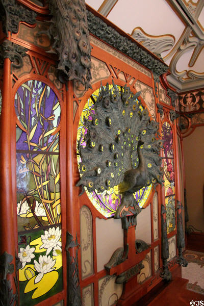 Details of elaborate peacock & stained glass (1901) in Art Nouveau style in Boutique Fouquet at Carnavalet Museum. Paris, France.