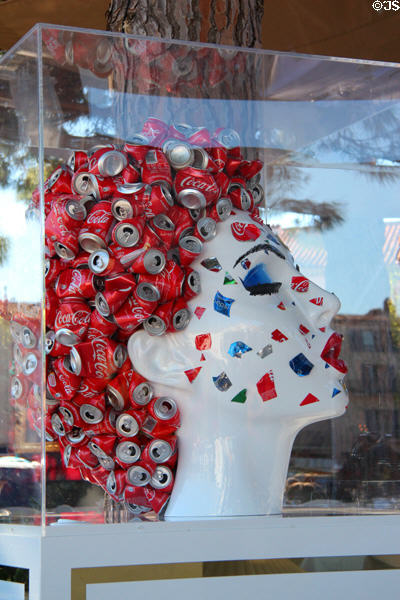 Gallery window display along harbor. St Tropez, France.