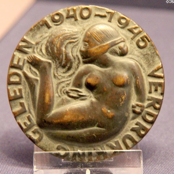 Occupation, made in secret, symbolizing Dutch resistance movement during WWII (c1940-45); dies for medal made by Pieter Starreveld at Teylers Museum. Haarlem, Netherlands.