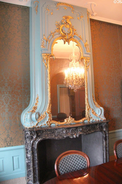 Ornate mirror over fireplace in room used as an office in the home of Pieter Teyler at Teylers Museum. Haarlem, Netherlands.