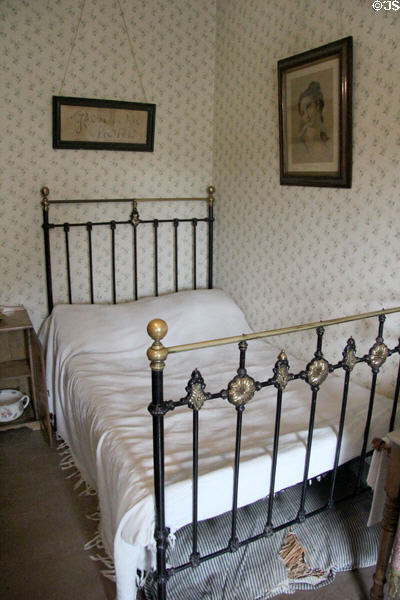 Cast iron bedstead at Tenement House museum. Glasgow, Scotland.