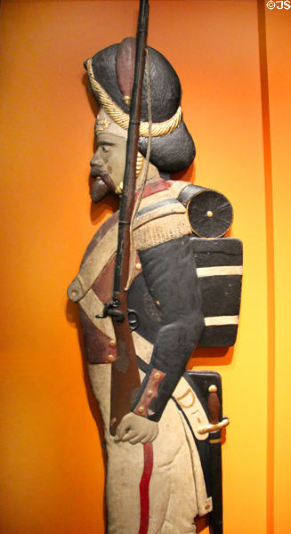 Cast-iron figure of a soldier (1800's) which was placed on a balcony of the Dutch House at M-Shed Museum. Bristol, England.