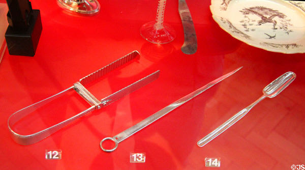 Silver tableware including: asparagus servers (1819-20 by Henry Chawner, London); meat skewer (1799-1800 by John Fayle, London); & marrow scoop (1762-63 by William Turner, London) at Bristol Museum & Art Gallery. Bristol, England.
