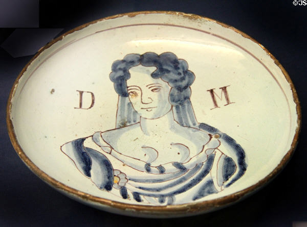 Ceramic shallow bowl (1690) perhaps depicting Sarah Jennings, later Duchess of Marlborough, made in Brislington at Bristol Museum & Art Gallery. Bristol, England.