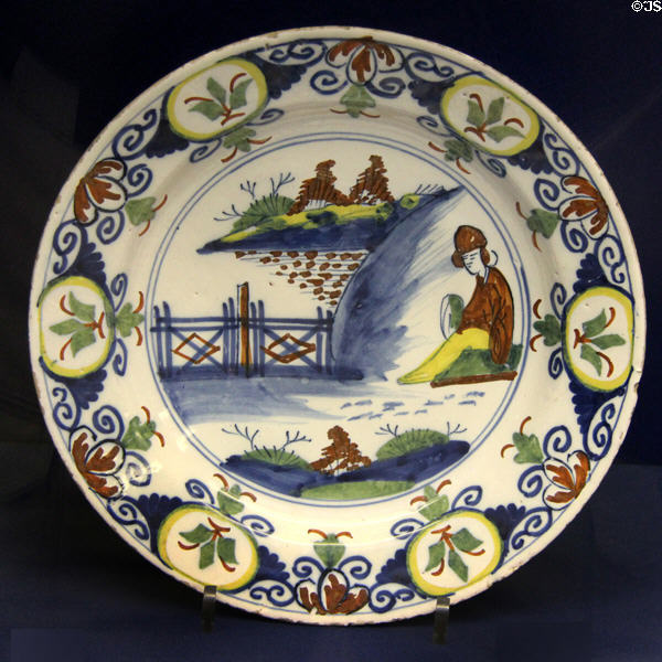 Ceramic plate (c1740) with Chinese style pattern by Josiah Bundy, Limekiln Lane Bristol at Bristol Museum & Art Gallery. Bristol, England.