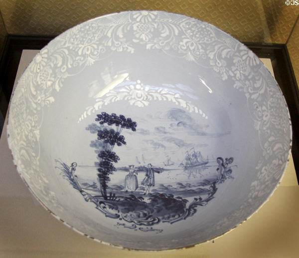 Ceramic punch bowl (c1765) with distinctive "white-white" pattern around the border, made in Bristol, possibly by John Owen, at Bristol Museum & Art Gallery. Bristol, England.