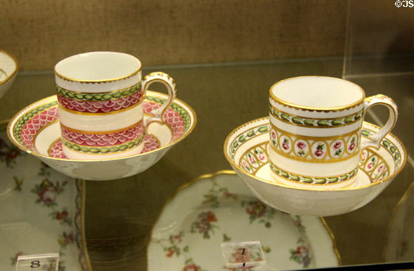 Porcelain coffee cups & saucers (c1775) overglaze painted & gilded in the new-classical taste, made by Richard Champion at Bristol Porcelain at Bristol Museum & Art Gallery. Bristol, England.