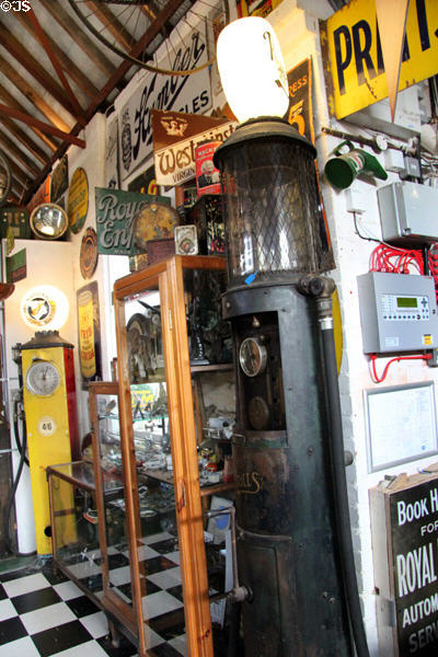Antique gas pumps operated by crank at Cotswold's Motoring Museum. Bourton-on-the-Water, England.