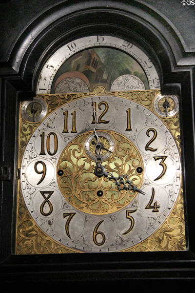 Face of long case clock (1904) by Spaulding & Co. of Chicago made of Irish bog oak at Ulster American Folk Park. Omagh, Northern Ireland.