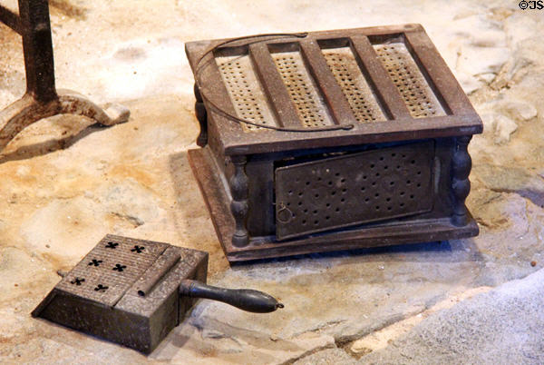 Coal scoop (c1800) & footwarmer (early 19thC) at Henry Whitfield State Museum. Guilford, CT.