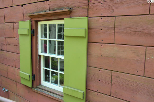 Wide plank walls & shutters on older section of Bush Holley House. Cos Cob, CT.