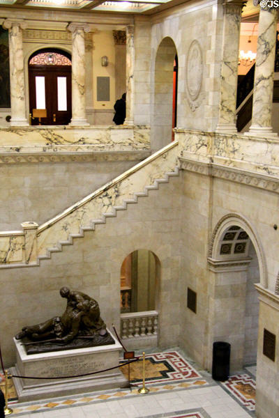 Hall leading to rotunda with stairway at Massachusetts State House. Boston, MA.