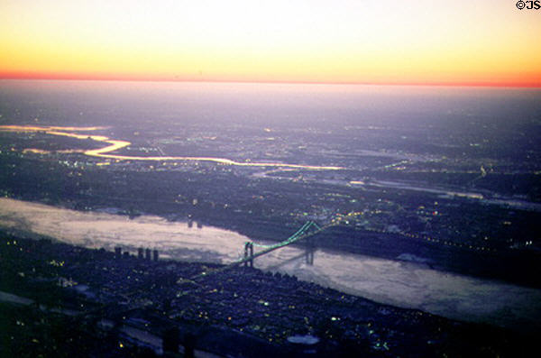 George Washington Bridge over Hudson River at sunset from air. New York, NY.