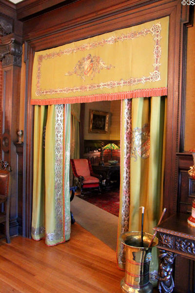 Curtained doorway from central hall at McFaddin-Ward House. Beaumont, TX.