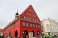 Town Hall in red heritage building on market square. Greifswald, Germany.