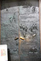 Greifswald Town Hall bronze doors by Joachim Jastram documents saving of town through 1945 surrender to Soviet troops. Greifswald, Germany.