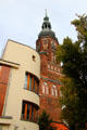 Art Moderne residence with St Nicholas Church tower. Greifswald, Germany.