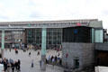 Travelers in plaza outside Köln Central Station. Köln, Germany.