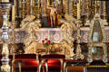 Gilded weeping angels on altar of St Benedict church at Benediktbeuern Abbey. Germany.