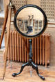 Antique concave inverting mirror on stand at Teylers Museum. Haarlem, Netherlands.