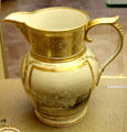 Ceramic jug overglaze-painted & gilded, painted on one side with Bristol coat-of-arms & other side with view of Bristol from Clifton Wood, probably a presentation item, made in Worcester at Bristol Museum. Bristol, England.