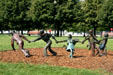 Sculpture group of children playing snap the whip in Navy Pier Park. Chicago, IL.